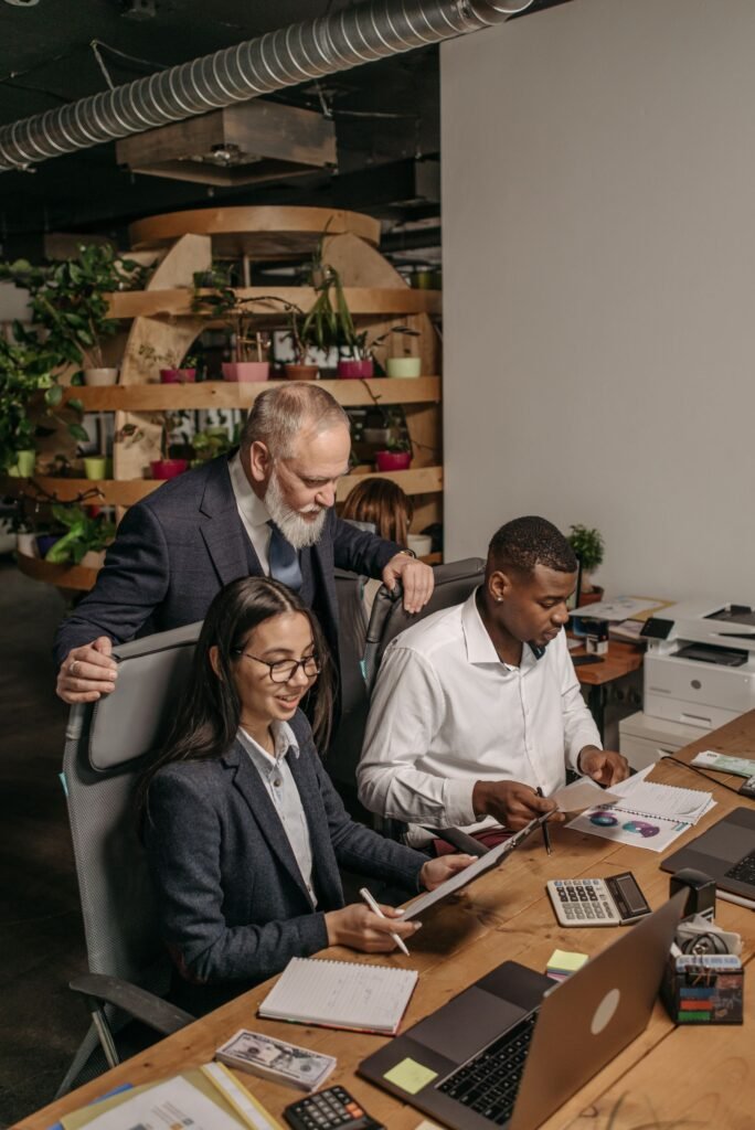 Colleagues collaborating in a modern accounting office